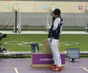 South Korea's Jin Jong-oh shoots during the men's 10-meter air pistol event at the 2012 Summer Olympics, Friday, July 27, 2012, in London. (AP Photo/Darron Cummings)
